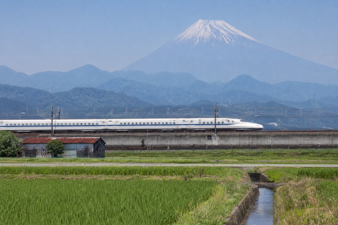 The Tokaido Shinkansen runs along the southern foot of the mountain